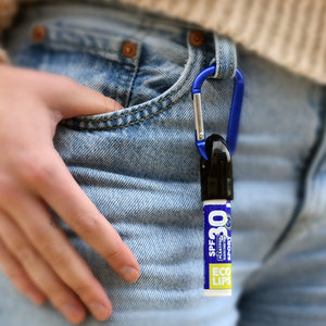 SPF lip balm with the lid attached to the carabiner