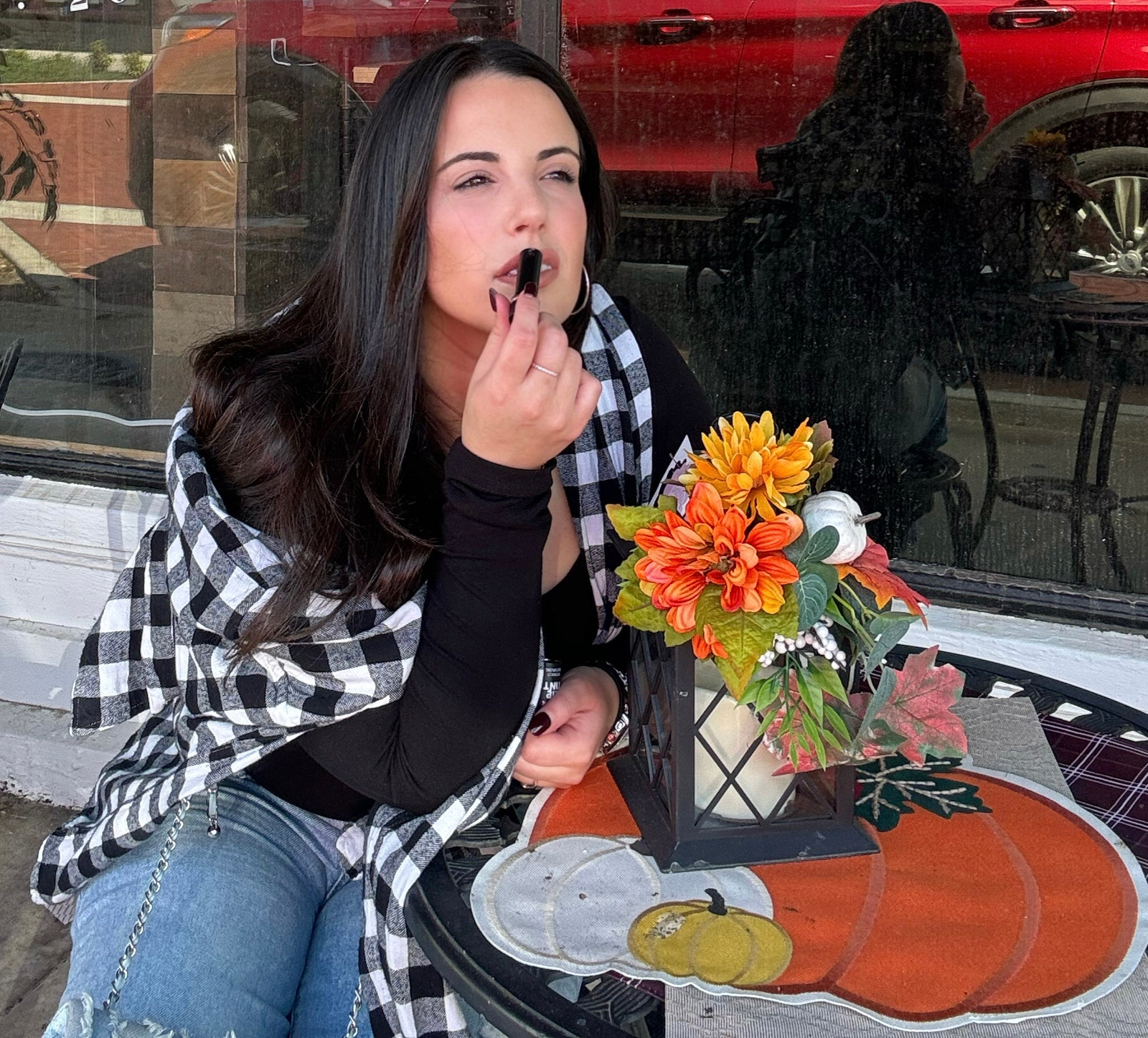 person holding white plastic tube bottle