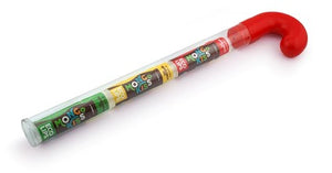 Promotional image of lip balm products with text highlighting larger size and benefits on a green background.