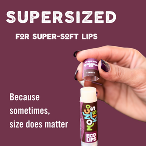 Two smiling children holding up Mongo Kiss lip balms 